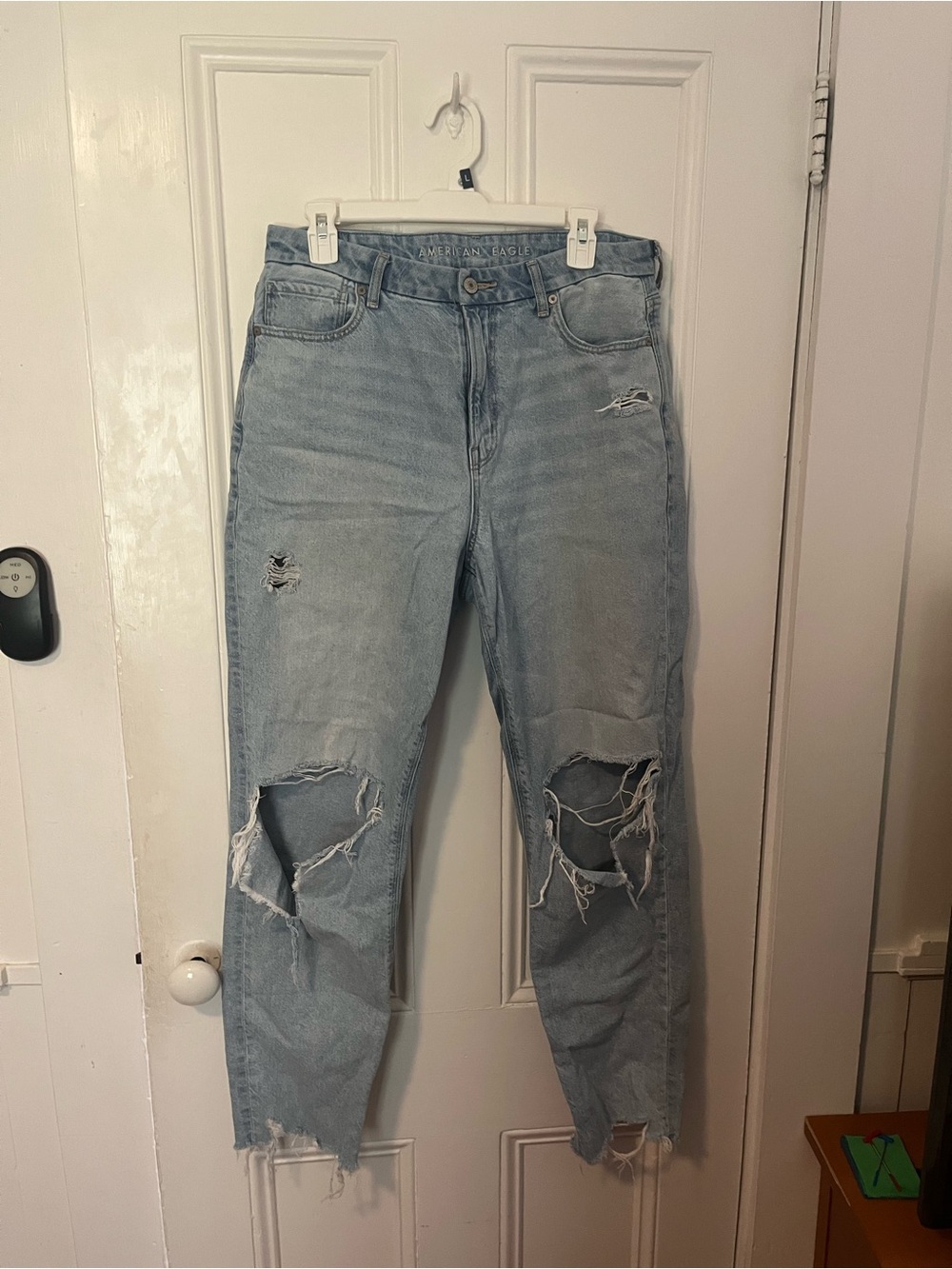Light wash distressed American eagle jeans